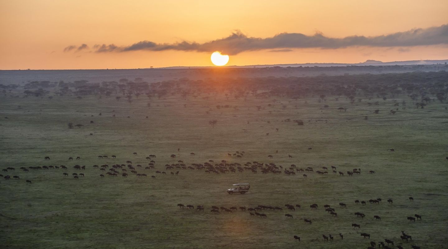Sunset views at the Legendary Migrational Camp, a key spot for great wildebeest migration safari.
