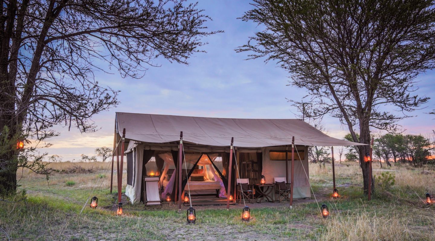 Exterior of a mobile camp tent in the Serengeti an ideal destination for witnessing the great migration.