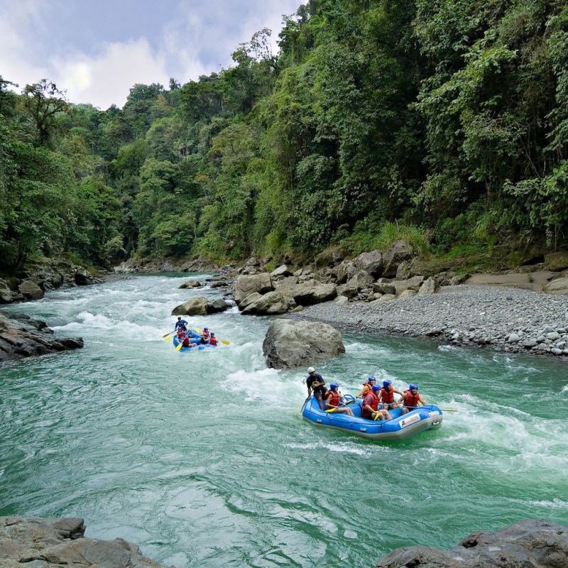 Rafting towards Pacuare Lodge, popular for family adventures in Latin America.